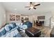 Open living space with sectional sofa, dining area, hardwood floors at 107 York Dr, Oxford, NC 27565