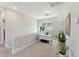 Bright and spacious home office with a desk and plants at 107 York Dr, Oxford, NC 27565