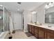 Elegant bathroom with double vanity, soaking tub, and separate shower at 1109 Timbercut Dr, Durham, NC 27703