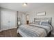 Comfortable bedroom with double doors and ensuite bathroom at 1109 Timbercut Dr, Durham, NC 27703