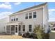 Gray two-story house with screened porch and backyard at 1109 Timbercut Dr, Durham, NC 27703
