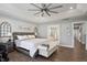 Spacious main bedroom with ensuite bathroom access and wood flooring at 1109 Timbercut Dr, Durham, NC 27703