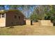 Brick home with fenced backyard and side gate at 1202 Vandora Ave, Garner, NC 27529