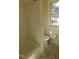 Bathroom with shower/tub combo and checkered floor at 1202 Vandora Ave, Garner, NC 27529