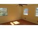 Spacious bedroom with hardwood floors and large windows at 1202 Vandora Ave, Garner, NC 27529