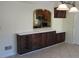 Dining area with built-in cabinetry and tile floor at 1202 Vandora Ave, Garner, NC 27529