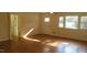 Living room with hardwood floors and lots of natural light at 1202 Vandora Ave, Garner, NC 27529