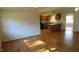 Bright living room with hardwood floors and natural light at 1202 Vandora Ave, Garner, NC 27529