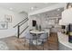 Elegant dining area with kitchen access and stylish light fixtures at 1245 S Blount Street # 101, Raleigh, NC 27601