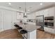 Modern kitchen with gray countertops, stainless steel appliances, and island at 1245 S Blount Street # 101, Raleigh, NC 27601