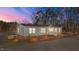 Lakefront home with landscaped yard and private dock at 261 Willifords Pt Dr, Roxboro, NC 27574
