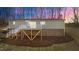 Elevated deck and stairs leading to a waterfront home at 261 Willifords Pt Dr, Roxboro, NC 27574