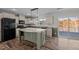 Modern kitchen with island and stainless steel appliances at 261 Willifords Pt Dr, Roxboro, NC 27574