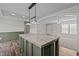 Open concept kitchen with island and access to living room at 261 Willifords Pt Dr, Roxboro, NC 27574