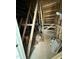 View of the unfinished attic displaying exposed beams and utilities, revealing the construction details of the home at 2405 Englemann Dr # 121, Apex, NC 27502