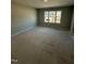 Bedroom featuring a large window and neighborhood view at 2405 Englemann Dr # 121, Apex, NC 27502