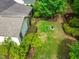 Aerial view of the home showcasing the back yard and landscaping at 241 Serenity Hill Cir, Chapel Hill, NC 27516