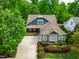 Aerial view of inviting blue home with spacious lot at 241 Serenity Hill Cir, Chapel Hill, NC 27516