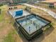 Aerial shot of outdoor sports courts including basketball and pickleball courts available in the community at 241 Serenity Hill Cir, Chapel Hill, NC 27516