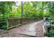 Enjoy community trails through lush trees and landscaping, encouraging exploration and outdoor activities at 241 Serenity Hill Cir, Chapel Hill, NC 27516