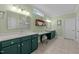 Large main bathroom with dual sinks, ample vanity space, and great natural light at 241 Serenity Hill Cir, Chapel Hill, NC 27516