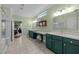 Spacious main bathroom with dual sinks, vanity space, and tile flooring at 241 Serenity Hill Cir, Chapel Hill, NC 27516