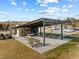 Aerial view of the community picnic area with outdoor seating, a covered structure, and parking at 241 Serenity Hill Cir, Chapel Hill, NC 27516