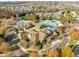 Aerial view of neighborhood clubhouse featuring swimming pools, splashpad, and lounge areas at 241 Serenity Hill Cir, Chapel Hill, NC 27516