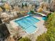 Aerial view of a community lap pool with umbrellas and lounge chairs at 241 Serenity Hill Cir, Chapel Hill, NC 27516