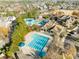 Aerial view of the community pool area including slide, splash pad, and covered seating at 241 Serenity Hill Cir, Chapel Hill, NC 27516