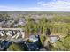 Aerial view showcasing home's setting and surrounding neighborhood at 2500 Shadow Hills Ct Ct, Raleigh, NC 27612
