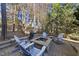 Cozy fire pit and seating area in the backyard at 2500 Shadow Hills Ct Ct, Raleigh, NC 27612