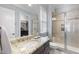 Bathroom with granite vanity and large walk-in shower at 2500 Shadow Hills Ct Ct, Raleigh, NC 27612