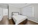 Well-lit bedroom with hardwood floors and ample closet space at 2500 Shadow Hills Ct Ct, Raleigh, NC 27612