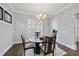 Bright breakfast nook features a round table and four chairs, perfect for enjoying morning meals at 2500 Shadow Hills Ct Ct, Raleigh, NC 27612
