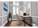 Bright home office features a desk, chair, and plenty of natural light at 2500 Shadow Hills Ct Ct, Raleigh, NC 27612