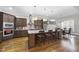 Modern kitchen with large island, stainless steel appliances, and ample cabinet space at 2500 Shadow Hills Ct Ct, Raleigh, NC 27612