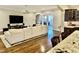 Open concept kitchen with granite island, stainless steel appliances, and hardwood floors at 2500 Shadow Hills Ct Ct, Raleigh, NC 27612
