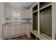 Laundry room with built-in cabinets and a sink at 261 Willifords Pt Dr, Roxboro, NC 27574
