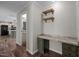 Home office with built-in shelves and a granite countertop desk at 261 Willifords Pt Dr, Roxboro, NC 27574