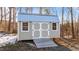Exterior view of a large storage shed with ramp access at 261 Willifords Pt Dr, Roxboro, NC 27574