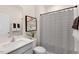 Clean bathroom with a shower/tub combo and modern vanity at 263 Hanging Elm Ln, Fuquay Varina, NC 27526