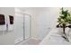 Bathroom with double vanity, shower, and plenty of counter space at 263 Hanging Elm Ln, Fuquay Varina, NC 27526