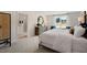 Main bedroom with king bed, walk-in closet, and window views at 263 Hanging Elm Ln, Fuquay Varina, NC 27526