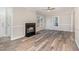 Living room boasts hardwood floors and a cozy fireplace at 2805 Chamberlain Rd, Rocky Mount, NC 27803