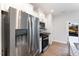 Stainless steel refrigerator and microwave in modern kitchen at 31 Burford Way, Angier, NC 27501