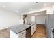 Granite kitchen island with sink and dishwasher at 31 Burford Way, Angier, NC 27501