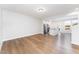 Open living room with hardwood floors and kitchen views at 31 Burford Way, Angier, NC 27501