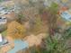 Aerial view of a vacant lot with a newly graveled driveway at 320B W Orange St, Hillsborough, NC 27278