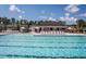 Community pool and clubhouse with surrounding trees at 341 Broomside Ave, Raleigh, NC 27603